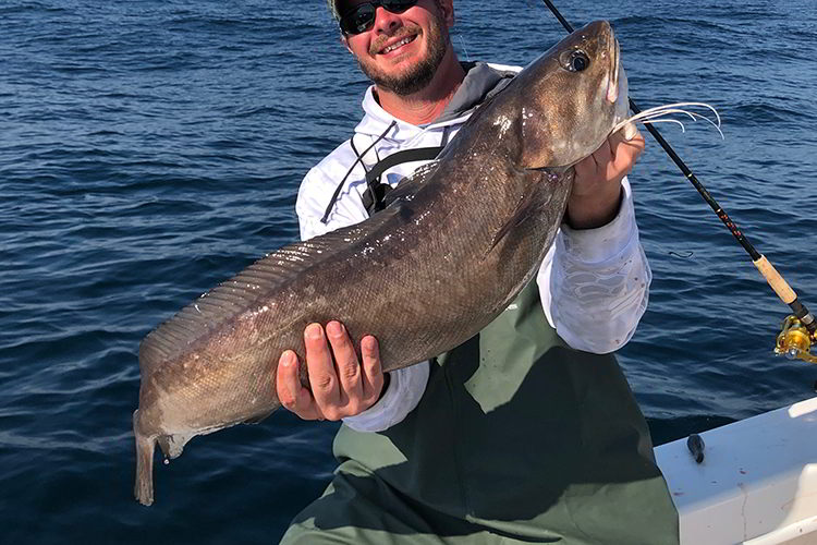 Brian Gay holding record-setting white hake.